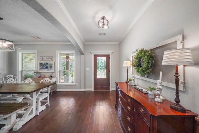 5112 E Settlers Bnd, Montgomery, TX 77316 - foyer featuring dark wood-style flooring, baseboards, and ornamental molding