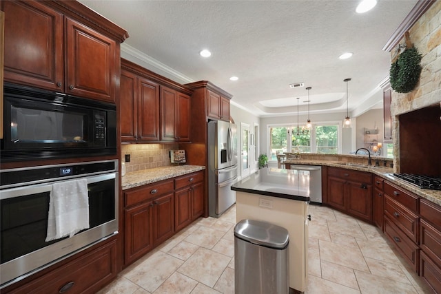 5112 E Settlers Bnd, Montgomery, TX 77316 - kitchen with black appliances, a sink, backsplash, recessed lighting, and hanging light fixtures