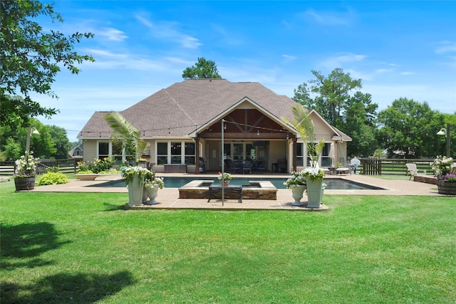 5112 E Settlers Bnd, Montgomery, TX 77316 - rear view of house featuring a shingled roof and a patio