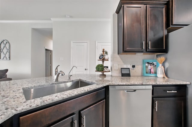 4609 Autumn Morning Dr, Spring, TX 77386 - kitchen with stainless steel dishwasher, a sink, ornamental molding, dark brown cabinetry, and light stone countertops