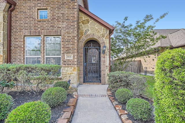 2806 King Point View Ln, Spring, TX 77388 - property entrance with stone siding and brick siding