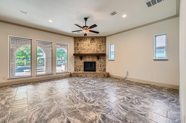 2806 King Point View Ln, Spring, TX 77388 - unfurnished living room featuring ornamental molding, a ceiling fan, baseboards, a stone fireplace, and recessed lighting