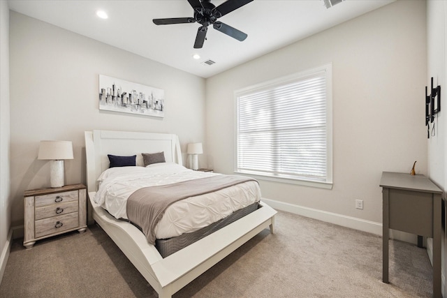 4019 Drummond St, Houston, TX 77025 - carpeted bedroom featuring baseboards, recessed lighting, and ceiling fan