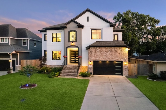 4019 Drummond St, Houston, TX 77025 - view of front of property with concrete driveway, a garage, brick siding, and stucco siding