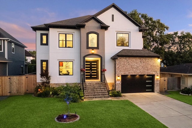 4019 Drummond St, Houston, TX 77025 - french country inspired facade with an attached garage, stucco siding, driveway, and a gate
