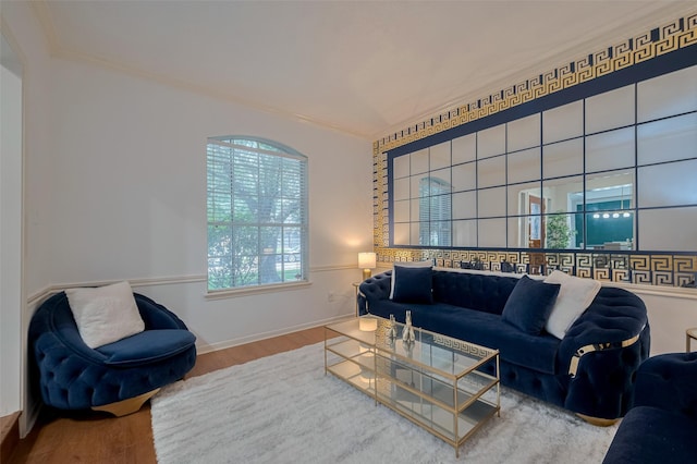 11943 Natural Bridges Ln, Sugar Land, TX 77498 - living room featuring crown molding, wood finished floors, and baseboards