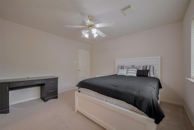 11943 Natural Bridges Ln, Sugar Land, TX 77498 - bedroom featuring light carpet, ceiling fan, and baseboards