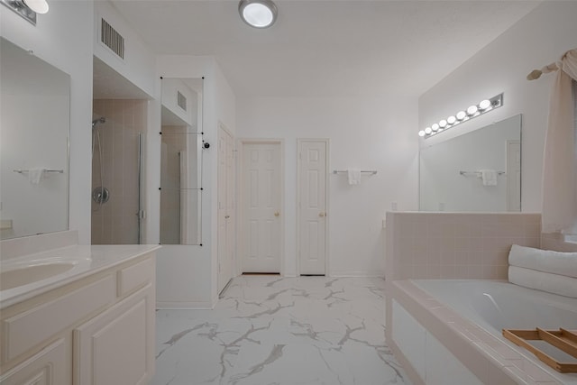 11943 Natural Bridges Ln, Sugar Land, TX 77498 - full bath featuring a garden tub, vanity, a stall shower, marble look tiles, and baseboards