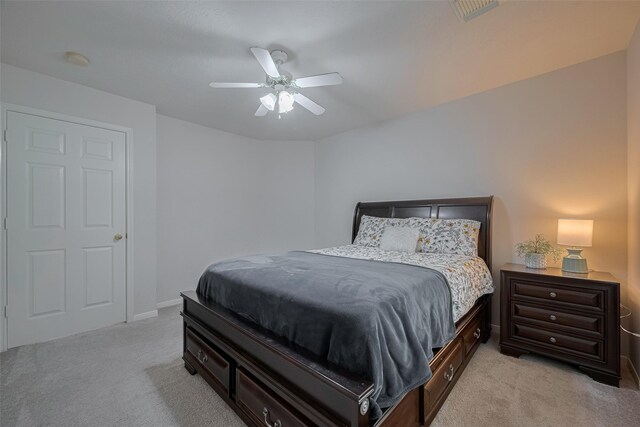 11943 Natural Bridges Ln, Sugar Land, TX 77498 - bedroom featuring light colored carpet, a ceiling fan, and baseboards