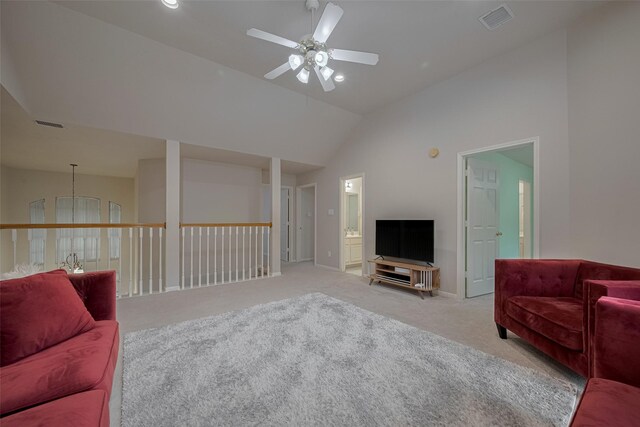 11943 Natural Bridges Ln, Sugar Land, TX 77498 - carpeted living room with a ceiling fan, vaulted ceiling, baseboards, and recessed lighting