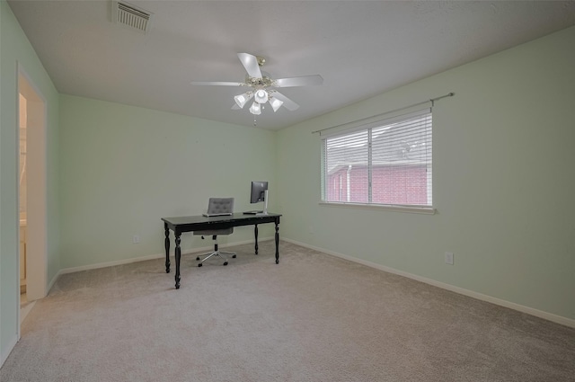 11943 Natural Bridges Ln, Sugar Land, TX 77498 - office area with light colored carpet, ceiling fan, and baseboards