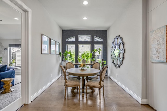 2715 Merlin Way, Katy, TX 77493 - dining area with plenty of natural light, recessed lighting, wood finished floors, and baseboards