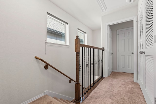 10822 Brittmoore Oaks Pl, Houston, TX 77043 - stairs featuring carpet flooring and baseboards