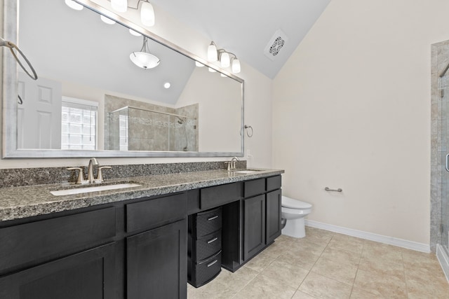 10822 Brittmoore Oaks Pl, Houston, TX 77043 - bathroom featuring vaulted ceiling, a stall shower, double vanity, toilet, and baseboards
