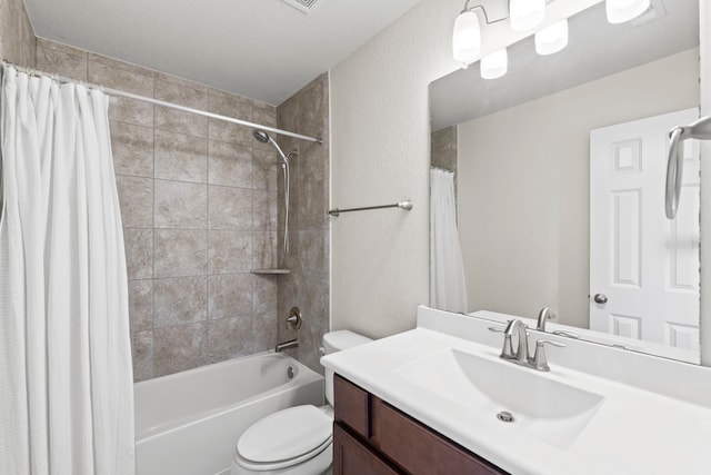 10822 Brittmoore Oaks Pl, Houston, TX 77043 - bathroom featuring toilet, vanity, shower / bath combo with shower curtain, and a textured wall