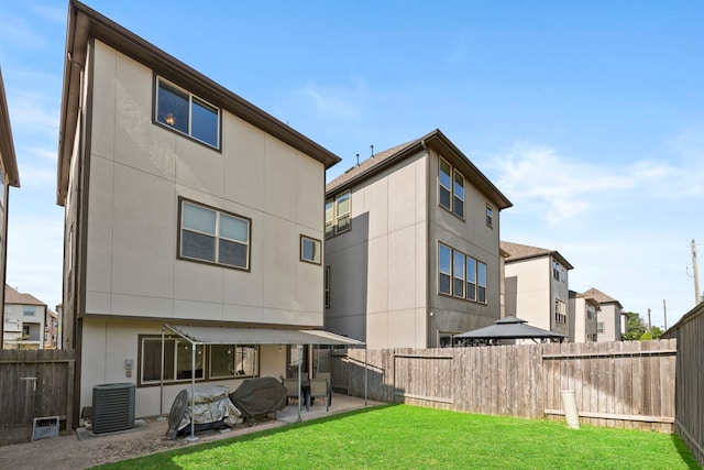 10822 Brittmoore Oaks Pl, Houston, TX 77043 - rear view of property featuring a patio and central AC unit