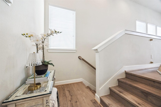 809 Burton Landing Ln, Houston, TX 77008 - stairway featuring wood finished floors and baseboards
