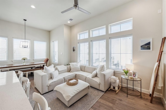 809 Burton Landing Ln, Houston, TX 77008 - living area with wood finished floors, a ceiling fan, baseboards, and recessed lighting