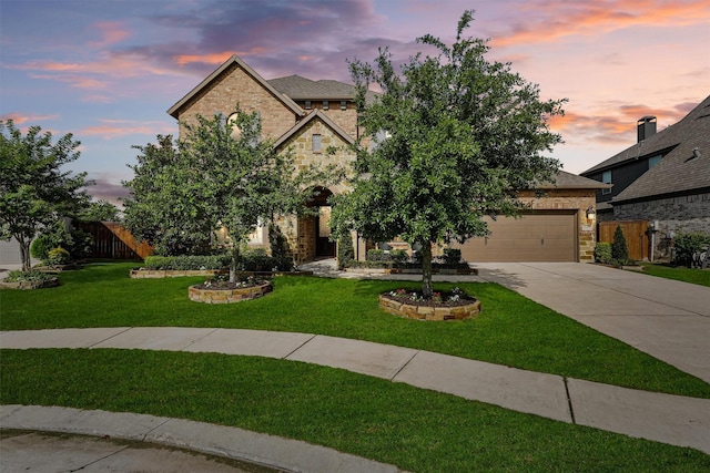 2603 Open Prairie Ln, Katy, TX 77493 - view of front of property with driveway, stone siding, a garage, and brick siding