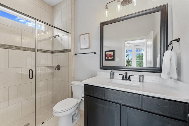 2603 Open Prairie Ln, Katy, TX 77493 - bathroom featuring toilet, vanity, and a stall shower