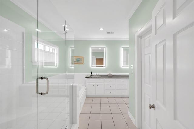 3509 Gramercy St, Houston, TX 77025 - bathroom featuring ornamental molding, tile patterned floors, double vanity, a bath, and a stall shower