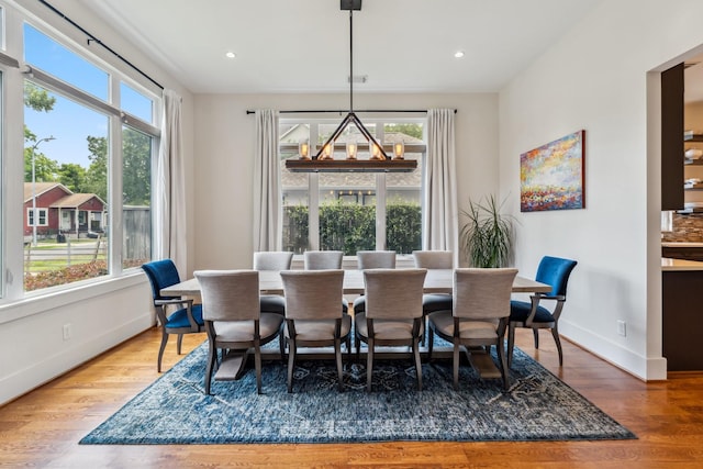 815 E 27th St, Houston, TX 77009 - dining space featuring healthy amount of natural light, baseboards, wood finished floors, and recessed lighting