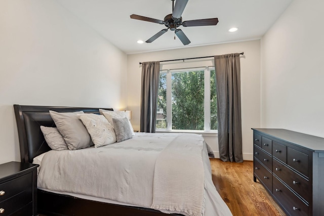 815 E 27th St, Houston, TX 77009 - bedroom featuring light wood-style floors, recessed lighting, a ceiling fan, and baseboards