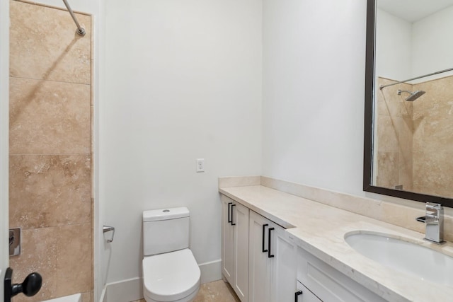 815 E 27th St, Houston, TX 77009 - full bathroom featuring vanity, toilet, and tiled shower