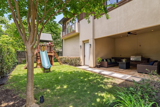 815 E 27th St, Houston, TX 77009 - view of yard featuring a playground and a ceiling fan