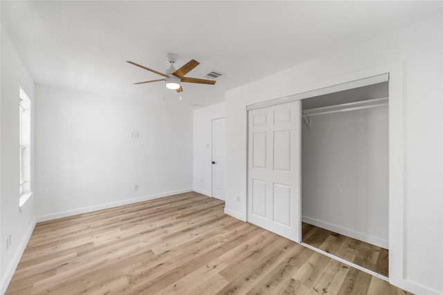 3906 Simsbrook Dr, Houston, TX 77045 - unfurnished bedroom with wood finished floors, a closet, and ceiling fan