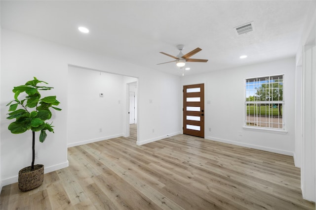 3906 Simsbrook Dr, Houston, TX 77045 - foyer with a ceiling fan, light wood-style floors, and recessed lighting
