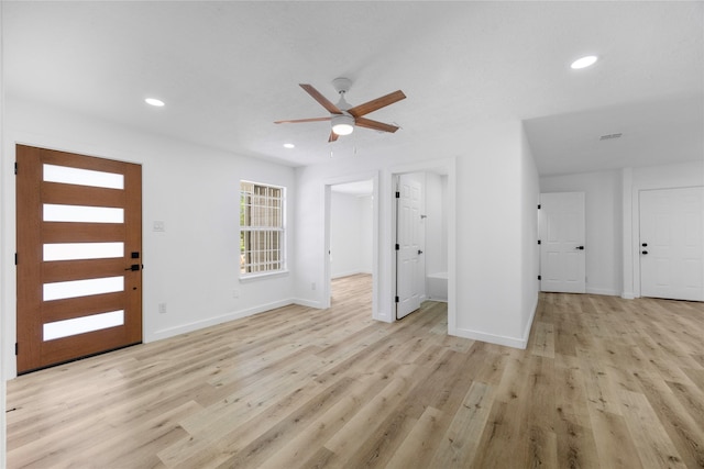 3906 Simsbrook Dr, Houston, TX 77045 - foyer featuring ceiling fan, recessed lighting, and light wood-style flooring