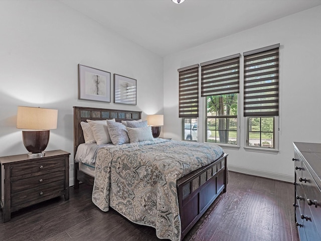 19003 Cove Manor Dr, Cypress, TX 77433 - bedroom featuring dark wood-type flooring and baseboards