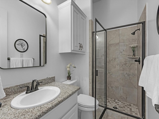 19003 Cove Manor Dr, Cypress, TX 77433 - full bathroom featuring a shower stall, vanity, and toilet