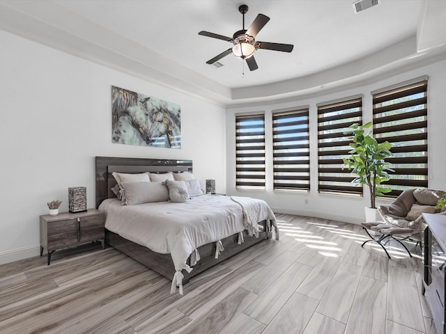 19003 Cove Manor Dr, Cypress, TX 77433 - bedroom with wood finished floors, ceiling fan, and baseboards