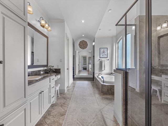 19003 Cove Manor Dr, Cypress, TX 77433 - bathroom featuring vanity, a garden tub, a shower stall, ornamental molding, and baseboards