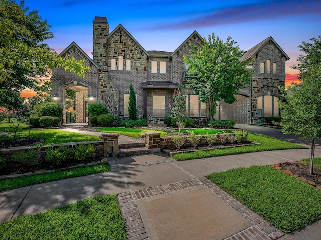 19003 Cove Manor Dr, Cypress, TX 77433 - view of front of house with brick siding and a chimney