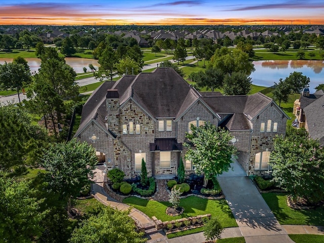 19003 Cove Manor Dr, Cypress, TX 77433 - aerial view at dusk of a water view and a residential view