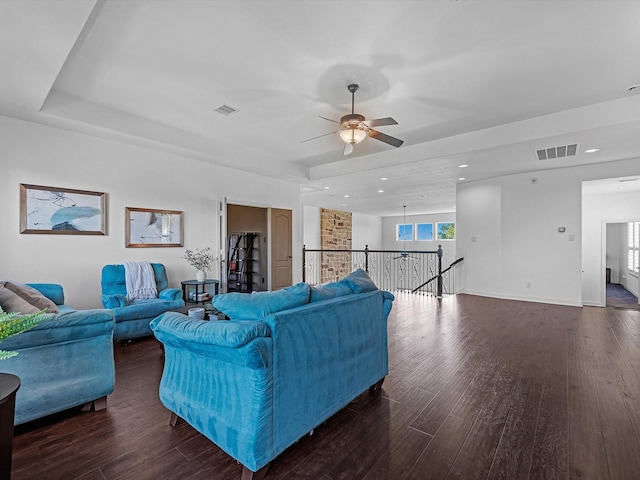 19003 Cove Manor Dr, Cypress, TX 77433 - living room featuring wood finished floors, a tray ceiling, ceiling fan, recessed lighting, and baseboards