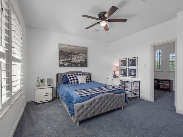 19003 Cove Manor Dr, Cypress, TX 77433 - bedroom with carpet flooring, baseboards, and ceiling fan