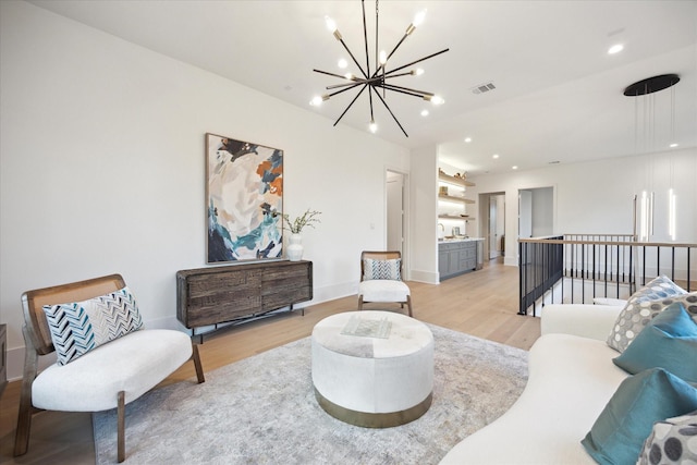 806 Holton St, Bellaire, TX 77401 - living area featuring a chandelier, light wood-type flooring, baseboards, and recessed lighting