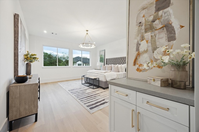 806 Holton St, Bellaire, TX 77401 - bedroom featuring light wood-style floors, a chandelier, baseboards, and recessed lighting