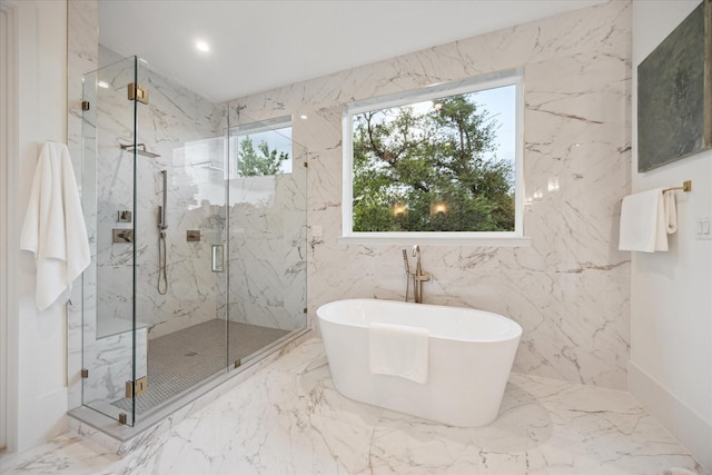 806 Holton St, Bellaire, TX 77401 - full bathroom with a freestanding tub, a marble finish shower, and marble tiled flooring