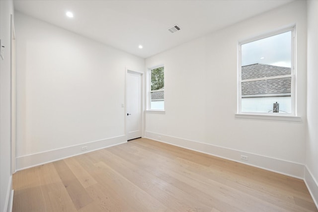806 Holton St, Bellaire, TX 77401 - spare room with light wood-style floors, baseboards, and recessed lighting