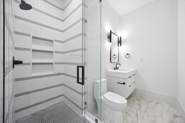 806 Holton St, Bellaire, TX 77401 - full bath with toilet, vanity, a shower stall, marble look tiles, and baseboards