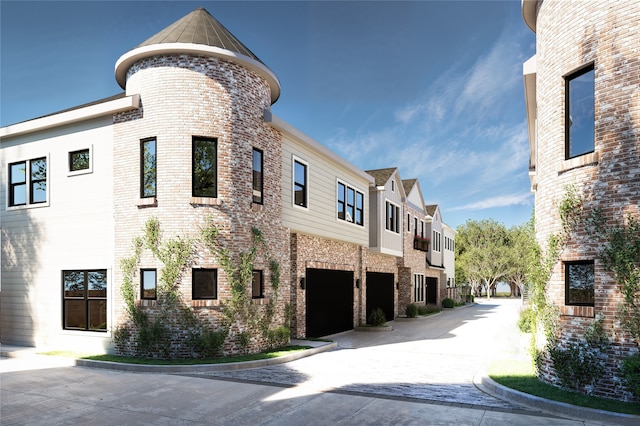2594 W Tidwell Rd, Houston, TX 77091 - view of property with a residential view and concrete driveway