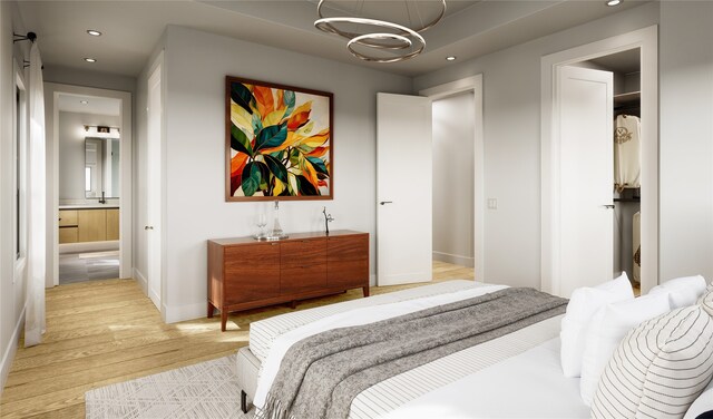 2594 W Tidwell Rd, Houston, TX 77091 - bedroom featuring light wood finished floors, recessed lighting, a chandelier, and connected bathroom