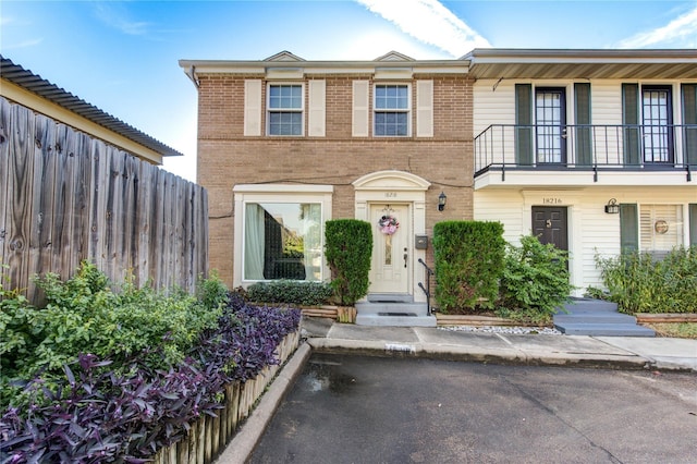 18218 Heritage Ln Unit 8218, Houston, TX 77058 - view of property with a balcony and brick siding