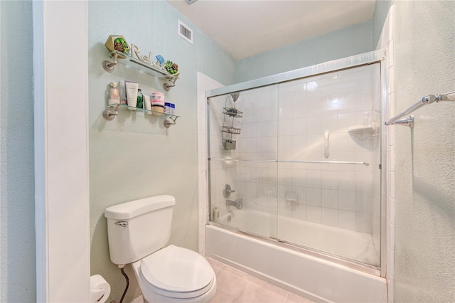 18218 Heritage Ln Unit 8218, Houston, TX 77058 - full bath with toilet, combined bath / shower with glass door, and tile patterned flooring