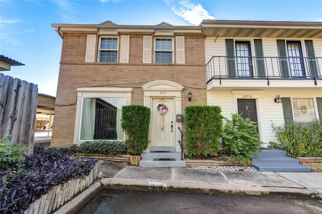 18218 Heritage Ln Unit 8218, Houston, TX 77058 - multi unit property featuring a balcony and brick siding